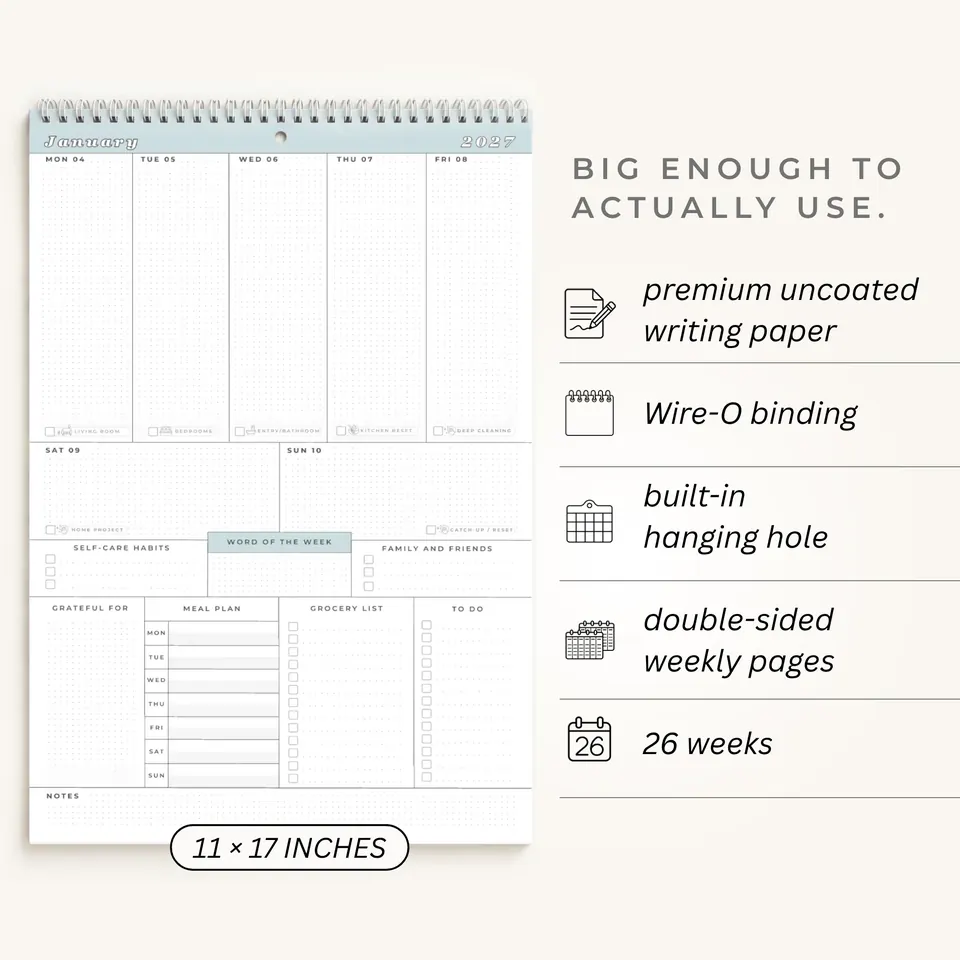 The blank calendar page, 11 by 17 inches, beside its details: premium uncoated writing paper, Wire-O binding, built-in hanging hole, double-sided weekly pages, 26 weeks.